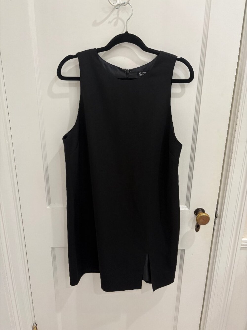Women's little black sleeveless cocktail dress from NET, Size 8, EUC
